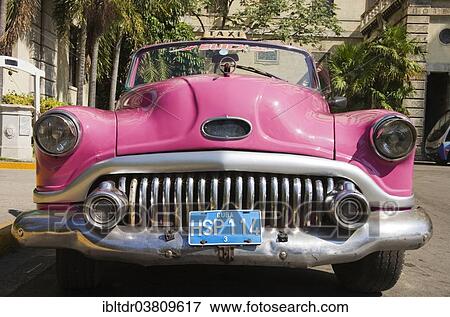 Stock Photo - "Buick, classic car parked in the streets of Havana, Havana, Cuba, North America". Fotosearch