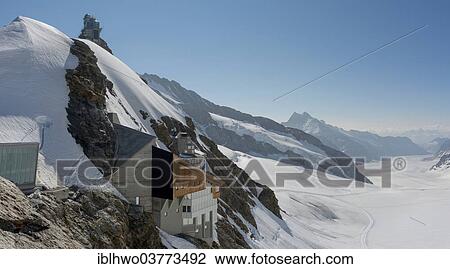 Stock Image - "Building at Jungfraujoch, behind the Aletsch glacier, Canton of Bern, Switzerland, Europe". Fotosearch