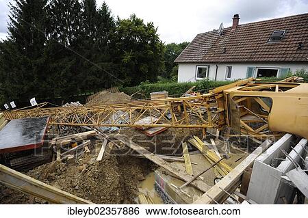 "Building crane crashing onto a building shell, Stuttgart, Baden-Wuerttemberg, Germany, Europe" View Large Photo Image Stock Photograph - "Building crane crashing onto a building shell, Stuttgart, Baden-Wuerttemberg, Germany, Europe". Fotosearch