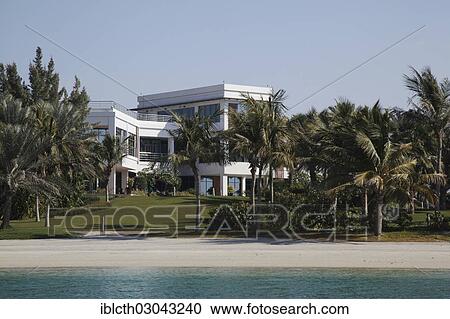 "Building on the first inhabited island of the artificial archipelago """"The World"""" or """"World Islands"""", owned by the ruling family, Dubai, Emirate of Dubai, United Arab Emirates, Asia" View Large Photo Image Stock Image - "Building on the first inhabited island of the artificial archipelago """"The World"""" or """"World Islands"""", owned by the ruling family, Dubai, Emirate of Dubai, United Arab Emirates, Asia". Fotosearch