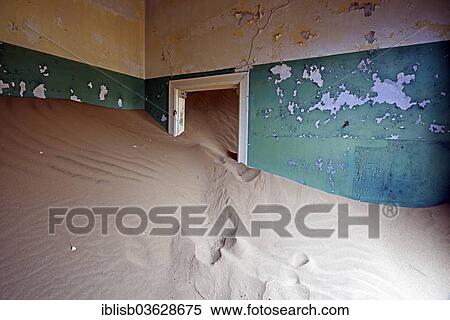 "Building taken over by sand from the desert, former diamond mining town, now a ghost town, Kolmanskop, Luderitz, Karas Region, Namibia, Africa" View Large Photo Image Stock Photography - "Building taken over by sand from the desert, former diamond mining town, now a ghost town, Kolmanskop, Luderitz, Karas Region, Namibia, Africa". Fotosearch