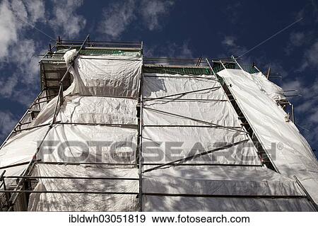 "Building with scaffolding and tarpaulins, Harz, Wernigerode, Saxony-Anhalt, Germany, Europe" View Large Photo Image Stock Photo - "Building with scaffolding and tarpaulins, Harz, Wernigerode, Saxony-Anhalt, Germany, Europe". Fotosearch