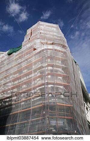 "Building with scaffolding undergoing exterior renovations, Budapest, Hungary, Europe" View Large Photo Image Picture - "Building with scaffolding undergoing exterior renovations, Budapest, Hungary, Europe". Fotosearch