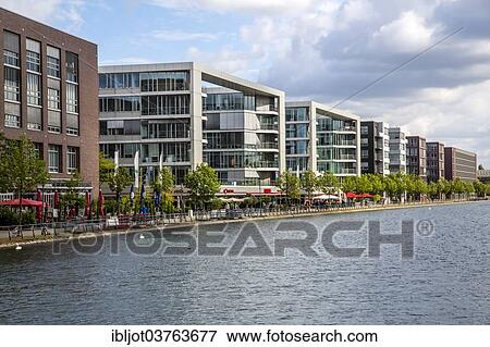"Buildings along Duisburg Inner Harbour, Innenhafen, Duisburg, Ruhr district, North Rhine-Westphalia, Germany, Europe" View Large Photo Image Stock Photo - "Buildings along Duisburg Inner Harbour, Innenhafen, Duisburg, Ruhr district, North Rhine-Westphalia, Germany, Europe". Fotosearch