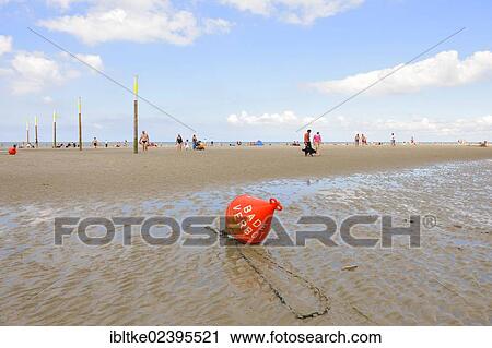 "Buoy marked """"Baden Verboten"""" or """"No Swimming"""" on the beach of St. Peter-Ording, Schleswig-Holstein, Germany, Europe" View Large Photo Image Stock Image - "Buoy marked """"Baden Verboten"""" or """"No Swimming"""" on the beach of St. Peter-Ording, Schleswig-Holstein, Germany, Europe". Fotosearch