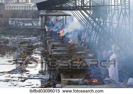 "Burning ghats with ongoing cremations, Kathmandu, Kathmandu District, Bagmati Zone, Nepal, Asia" View Large Photo Image Stock Photography - "Burning ghats with ongoing cremations, Kathmandu, Kathmandu District, Bagmati Zone, Nepal, Asia". Fotosearch