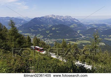 "Bus on Kehlsteinstrasse, view from Kehlstein Mountain towards Untersberg, Berchtesgaden, Berchtesgaden Alps, Upper Bavaria, Bavaria, Germany, Europe" View Large Photo Image Stock Photography - "Bus on Kehlsteinstrasse, view from Kehlstein Mountain towards Untersberg, Berchtesgaden, Berchtesgaden Alps, Upper Bavaria, Bavaria, Germany, Europe". Fotosearch