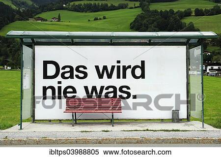 "Bus stop that says """"Das wird nie was"""" or """"that'll never work""""" View Large Photo Image Stock Photography - "Bus stop that says """"Das wird nie was"""" or """"that'll never work""""". Fotosearch