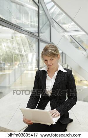 "Business woman with a laptop, Lower Saxony, Germany, Europe" View Large Photo Image Stock Photo - "Business woman with a laptop, Lower Saxony, Germany, Europe". Fotosearch