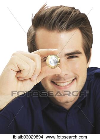 Businessman holding euro coin View Large Photo Image Picture - Businessman holding euro coin. Fotosearch