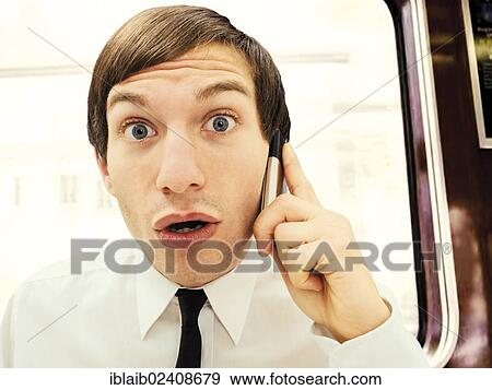 "Businessman with a serious face speaking on this mobile phone, portrait, stressed" View Large Photo Image Stock Photo - "Businessman with a serious face speaking on this mobile phone, portrait, stressed". Fotosearch