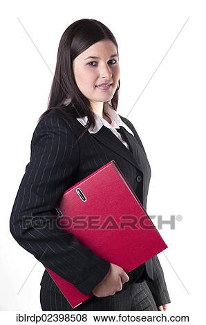 "Businesswoman holding a red folder in her arm, looking friendly" View Large Photo Image Stock Photo - "Businesswoman holding a red folder in her arm, looking friendly". Fotosearch