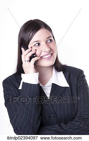 Stock Photo - "Businesswoman on the phone, looking happy". Fotosearch