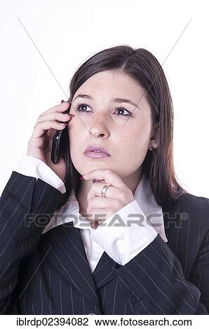 "Businesswoman on the phone, pondering" View Large Photo Image Stock Image - "Businesswoman on the phone, pondering". Fotosearch