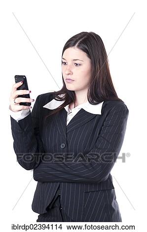 Businesswoman using a smartphone View Large Photo Image Picture - Businesswoman using a smartphone. Fotosearch