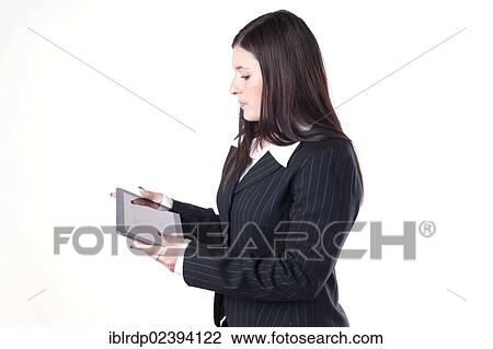Businesswoman using a tablet PC View Large Photo Image Stock Image - Businesswoman using a tablet PC. Fotosearch