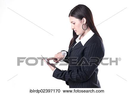 Businesswoman using a tablet PC View Large Photo Image Stock Image - Businesswoman using a tablet PC. Fotosearch