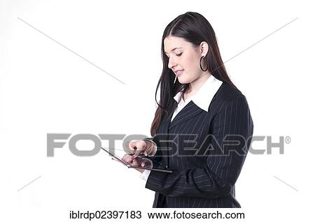 Businesswoman using a tablet PC View Large Photo Image Stock Image - Businesswoman using a tablet PC. Fotosearch