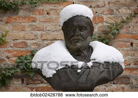 Stock Photo - "Bust covered with snow, Alter Suedlicher Friedhof cemetery, Munich, Bavaria, Germany, Europe". Fotosearch