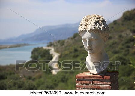 "Bust of Apollo in the ruins of the ancient city of Butrint, UNESCO World Cultural Heritage Site, Butrint, near Saranda, Vlore County, Albania, Europe" View Large Photo Image Stock Photo - "Bust of Apollo in the ruins of the ancient city of Butrint, UNESCO World Cultural Heritage Site, Butrint, near Saranda, Vlore County, Albania, Europe". Fotosearch