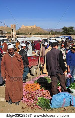Stock Photo - "Busy weekly market in Agdz, Draatal, Agdz, Souss-Massa-Draa region, Morocco, Africa". Fotosearch