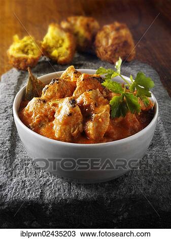 Stock Image - "Butter chicken, Indian food". Fotosearch