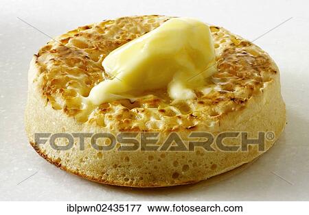 Buttered crumpet View Large Photo Image Stock Photo - Buttered crumpet. Fotosearch