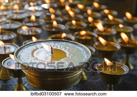 "Butterlamps for offerings, lighted, Bhandar, Solukhumbu District, Sagarmatha Zone, Nepal, Asia" View Large Photo Image Stock Photo - "Butterlamps for offerings, lighted, Bhandar, Solukhumbu District, Sagarmatha Zone, Nepal, Asia". Fotosearch