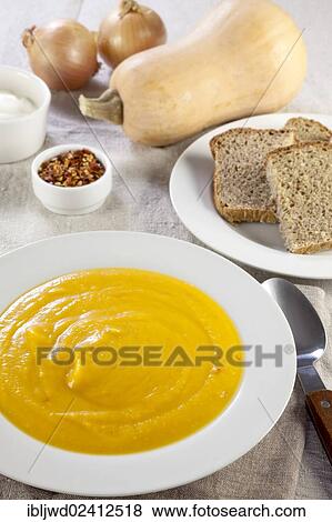 Butternut squash soup with chili View Large Photo Image Stock Photo - Butternut squash soup with chili. Fotosearch