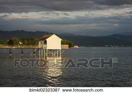 "Cabana in the evening light on the shore of Wasserburg peninsula, Lake Constance, Bavaria, Germany, Europe" View Large Photo Image Stock Photo - "Cabana in the evening light on the shore of Wasserburg peninsula, Lake Constance, Bavaria, Germany, Europe". Fotosearch