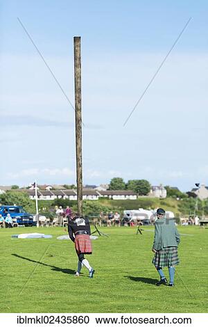 "Caber toss, a sports discipline involving the tossing of a large wooden pole, Helmsdale Highland Games, Helmsdale, Sutherland, Scotland, United Kingdom, Europe" View Large Photo Image Stock Image - "Caber toss, a sports discipline involving the tossing of a large wooden pole, Helmsdale Highland Games, Helmsdale, Sutherland, Scotland, United Kingdom, Europe". Fotosearch