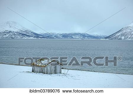 Stock Photograph - "Cabin on Lyngen fjord, Troms, Norway, Europe". Fotosearch