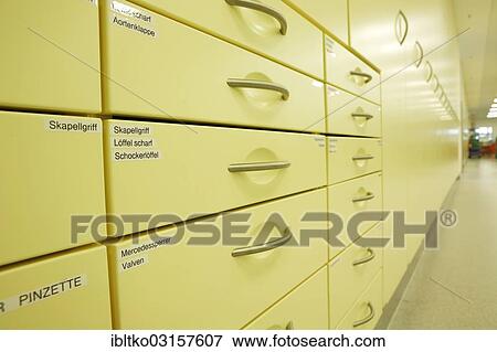 Cabinet for storing surgical instruments View Large Photo Image Stock Photo - Cabinet for storing surgical instruments. Fotosearch