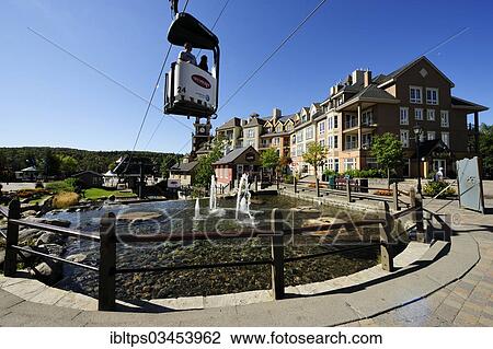 "Cable car running across the pedestrian area of ​​Mont-Tremblant, Mont-Tremblant, Quebec Province, Canada, North America" View Large Photo Image Stock Image - "Cable car running across the pedestrian area of ​​Mont-Tremblant, Mont-Tremblant, Quebec Province, Canada, North America". Fotosearch