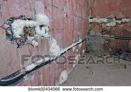 "Cable channels, wall cavities filled with foam insulation, renovation of an old building, Stuttgart, Baden-Wuerttemberg, Germany, Europe" View Large Photo Image Stock Photograph - "Cable channels, wall cavities filled with foam insulation, renovation of an old building, Stuttgart, Baden-Wuerttemberg, Germany, Europe". Fotosearch