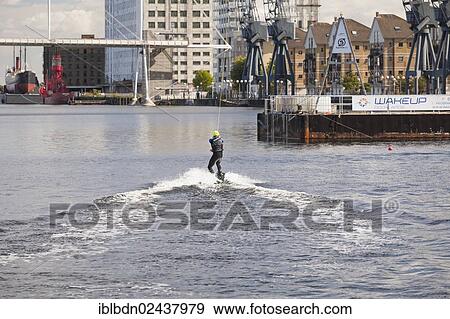 "Cable wakeboarding and wakeskating at Royal Victoria Docks in London, England, United Kingdom, Europe" View Large Photo Image Stock Photo - "Cable wakeboarding and wakeskating at Royal Victoria Docks in London, England, United Kingdom, Europe". Fotosearch