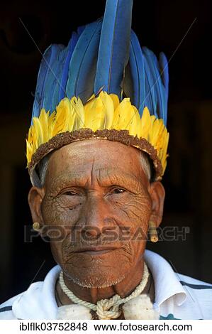 "Cacique of the Xavante people, indigenous tribe, with the headdress of a chief, Primavera do Leste, Mato Grosso, Brazil, South America" View Large Photo Image Stock Photo - "Cacique of the Xavante people, indigenous tribe, with the headdress of a chief, Primavera do Leste, Mato Grosso, Brazil, South America". Fotosearch