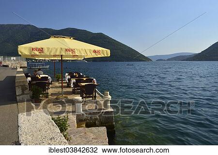 "Cafe and restaurant at Perast harbour, Bay of Kotor, Monte, The Balkans, Europe" View Large Photo Image Stock Image - "Cafe and restaurant at Perast harbour, Bay of Kotor, Monte, The Balkans, Europe". Fotosearch