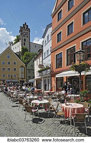 "Cafes in the pedestrian zone, Hohes Schloss, High Castle at back, Fuessen, Ostallgaeu, Allgaeu, Schwabia, Bavaria, Germany, Europe" View Large Photo Image Stock Image - "Cafes in the pedestrian zone, Hohes Schloss, High Castle at back, Fuessen, Ostallgaeu, Allgaeu, Schwabia, Bavaria, Germany, Europe". Fotosearch