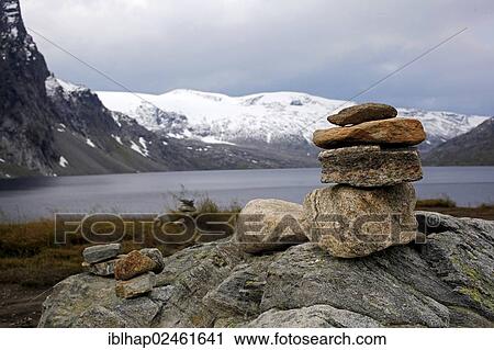 "Cairn along the mountain pass from Geiranger Fjord to Lom, Geiranger, More og Romsdal, Norway, Northern Europe, Europe" View Large Photo Image Stock Image - "Cairn along the mountain pass from Geiranger Fjord to Lom, Geiranger, More og Romsdal, Norway, Northern Europe, Europe". Fotosearch