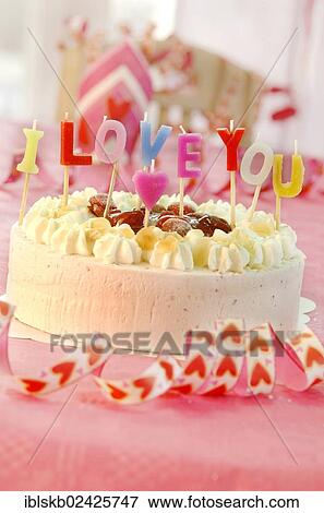 Cake with letter candles spelling the message I love you View Large Photo Image Stock Photo - Cake with letter candles spelling the message I love you. Fotosearch