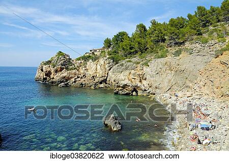 "Cala Deia pebble beach, near Deia, Sierra de Tramuntana, Majorca, Balearic Islands, Mediterranean, Spain, Europe" View Large Photo Image Stock Image - "Cala Deia pebble beach, near Deia, Sierra de Tramuntana, Majorca, Balearic Islands, Mediterranean, Spain, Europe". Fotosearch