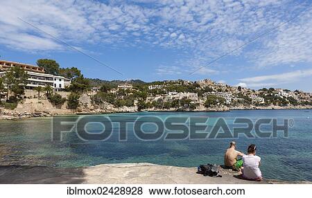"Cala Fornells, the Cala Fornells apartment complex at back, by architect Pedro Otzoup, Mallorca, Balearic Islands, Spain, Europe" View Large Photo Image Stock Photo - "Cala Fornells, the Cala Fornells apartment complex at back, by architect Pedro Otzoup, Mallorca, Balearic Islands, Spain, Europe". Fotosearch