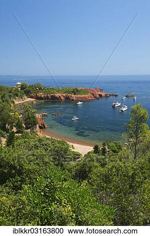 "Calanque bay with boats at Cap Roux in the Esterel mountains, Antheor, Saint-Raphael, French Riviera, Var, Provence-Alpes-Cote d? ÇÖAzur, France, Europe" View Large Photo Image Stock Image - "Calanque bay with boats at Cap Roux in the Esterel mountains, Antheor, Saint-Raphael, French Riviera, Var, Provence-Alpes-Cote d? ÇÖAzur, France, Europe". Fotosearch
