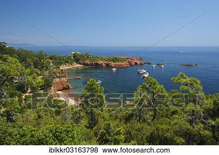 "Calanque bay with boats at Cap Roux in the Esterel mountains, Antheor, Saint-Raphael, French Riviera, Var, Provence-Alpes-Cote d? ÇÖAzur, France, Europe" View Large Photo Image Stock Photo - "Calanque bay with boats at Cap Roux in the Esterel mountains, Antheor, Saint-Raphael, French Riviera, Var, Provence-Alpes-Cote d? ÇÖAzur, France, Europe". Fotosearch