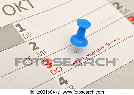"Calendar with a push pin marking """"Tag der Deutschen Einheit"""", German for """"Day of German Unity""""" View Large Photo Image Stock Photo - "Calendar with a push pin marking """"Tag der Deutschen Einheit"""", German for """"Day of German Unity""""". Fotosearch