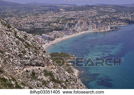 "Calp and the Playa Levante beach from the rock Penon de Ifach or Penyal d’Ifac, Costa Blanca, Calp, Costa Blanca, Alicante province, Spain, Europe" View Large Photo Image Stock Photography - "Calp and the Playa Levante beach from the rock Penon de Ifach or Penyal d’Ifac, Costa Blanca, Calp, Costa Blanca, Alicante province, Spain, Europe". Fotosearch