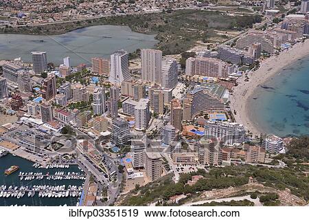 "Calp from the rock Penon de Ifach or Penyal d’Ifac, Costa Blanca, Calp, Costa Blanca, Alicante province, Spain, Europe" View Large Photo Image Stock Photo - "Calp from the rock Penon de Ifach or Penyal d’Ifac, Costa Blanca, Calp, Costa Blanca, Alicante province, Spain, Europe". Fotosearch