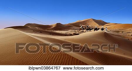 "Camel rides on the Sahara sand dunes of Erg Chebbi, Morocco, Africa" View Large Photo Image Stock Photo - "Camel rides on the Sahara sand dunes of Erg Chebbi, Morocco, Africa". Fotosearch