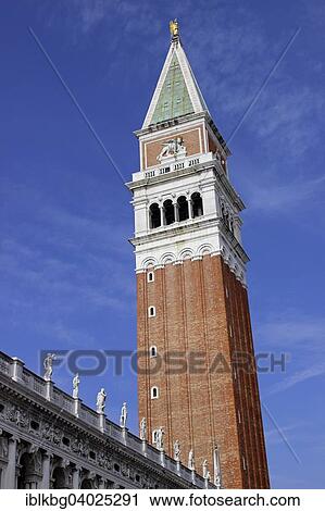 Stock Image - "Campanile and statues on the Biblioteca Marciana building, St. Mark's Square, Venice, Veneto, Italy, Europe". Fotosearch